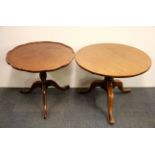 A 19th Century oak tilt top low wine table, Dia. 67cm. together with a later mahogany wine table.