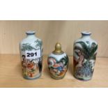 A pair of Chinese erotic decorated porcelain vases, H. 12cm. together with a similar decorated