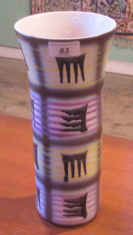 A mid-century West German tube vase, vibrantly decorated in a line and drip pattern, marked to base,