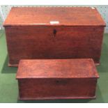 A George III North Country oak lidded box with end drawer, together with a further smaller oak box.