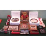 A collection of items relating to Manchester United, to include: vintage silk scarf, boxed wallet,