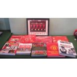 A collection of reference and coffee table books, relating to Manchester United,