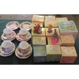 A collection of Royal Doulton Winnie the Pooh figurines, together with a Colclough part-tea service.