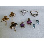 A amethyst and diamond oval cluster pendant, a pair of topaz half hoop earrings,