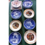 A collection of commemorative plates,