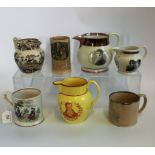 A collection of 19th century pearlware and other pottery commemorative mugs and jugs,