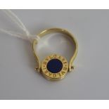 Bulgari, an onyx and lapis lazuli swivel ring,