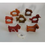 A set of seven plastic Art Deco vibrantly coloured napkin holders in the form of animals,