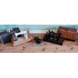An early 20th century oak cased Jones sewing machine,
