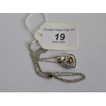 A diamond set heart shaped pendant,