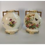 A pair of Aesthetic Movement porcelain flask shaped twin handled vases,