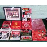 A collection of reference and coffee table books relating to Manchester United,