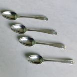 Four hallmarked silver bright cut bottom struck teaspoons.