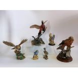A collection of bird figurines in porcelain and cast resin (6).