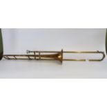 A lacquered brass Hawkes & Son vintage trombone.