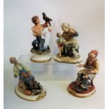 A collection of four Capodimonte bisque porcelain figure groups, to include: a falconer,