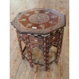 A 19th century Khanaya of Indian Indo-Moorish ivory and brass inlaid octagonal folding occasional