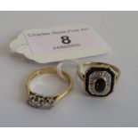 A three stone half hoop diamond ring, claw-set in 18ct gold mount,