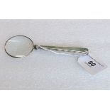 A hallmarked silver magnifying glass, Sheffield 1938.