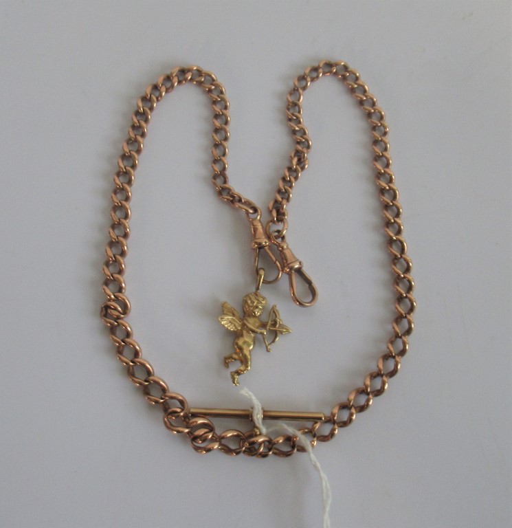 A 9ct rose gold curb pattern watch chain, with single clip connections and T bar,