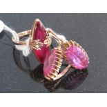 A single stone synthetic pink sapphire ring,