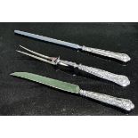 A hallmarked silver handled cake knife, carving fork and sharpening steel, all Sheffield 1966.