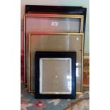 A collection of decorative picture frames (12).