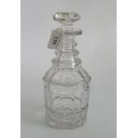 A circa 19th century D-ring glass decanter and stopper,