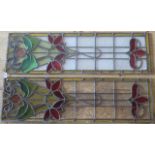 A pair of late Victorian stained and leaded glass panels,