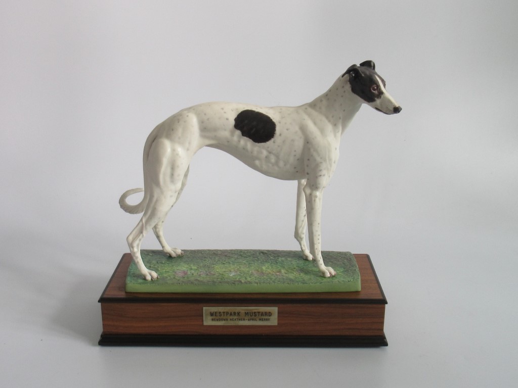 An Albany Fine China Company of Worcester, boxed porcelain model of a greyhound 'Westpark Mustard'.