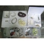 A quantity of silver white metal and costume jewellery,