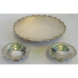 A large hallmarked silver scale pattern comport and two similar smaller side dishes,