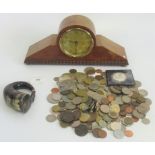 A vintage wooden mantle clock marked 'eight day' to dial,