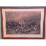 A large framed and glazed print of a hunting scene bearing printed signature,