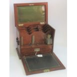 An Edwardian correspondence cabinet (minus key), with a glass inkwell (AF) of similar age.