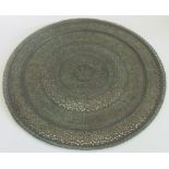 A large 19th century Persian influenced Kashmiri circular bronze tray,