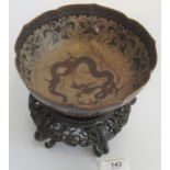 A 1920's Chinese Aventwine cloisonne lobed bowl, depicting a dragon,