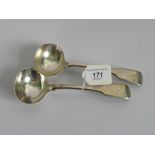 A pair of hallmarked silver soup ladles, London 1851/2.