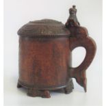 An 18th century Norwegian carved birch peg-type tankard,