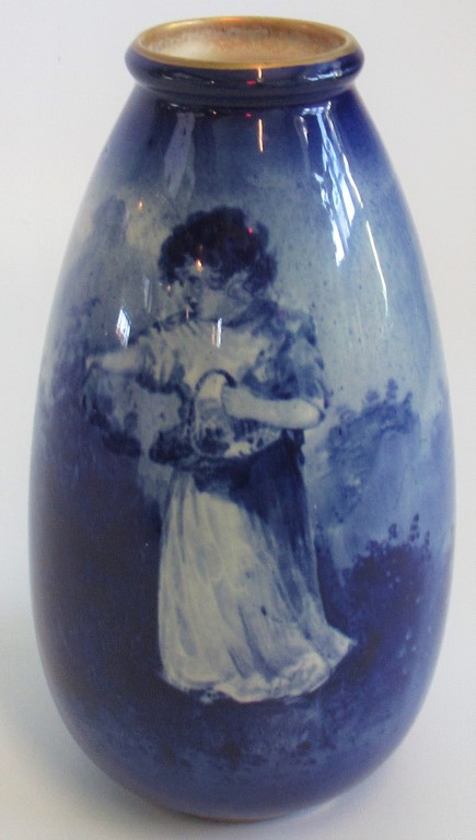A Royal Doulton Blue Child pattern vase, depicting a young girl picking fruit,