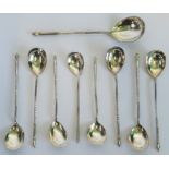 Nine Russian silver spoons with rope twist pattern handles.