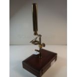 A BOTANIST'S MONOCULAR MICROSCOPE, CIRCA 1850; and another