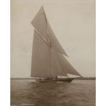A SEPIA PHOTOGRAPH OF H.M. RACING YACHT BRITANNIA BY BEKEN OF COWES