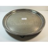 An Anchor Line plated serving tray, with three feet