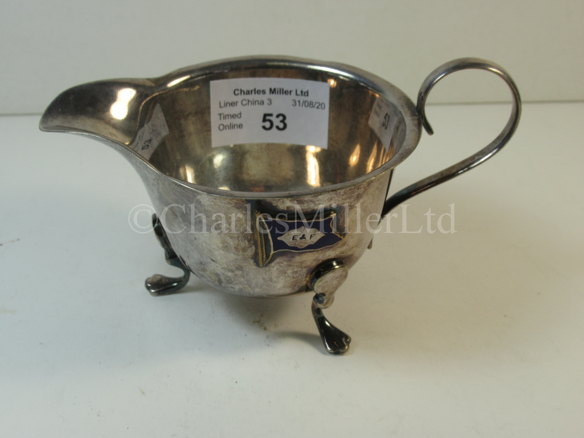 An Elders & Fyffes Line souvenir plated sauce jug, from S.S. 'Carare'