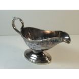 A German Africa Line plated sauce boat