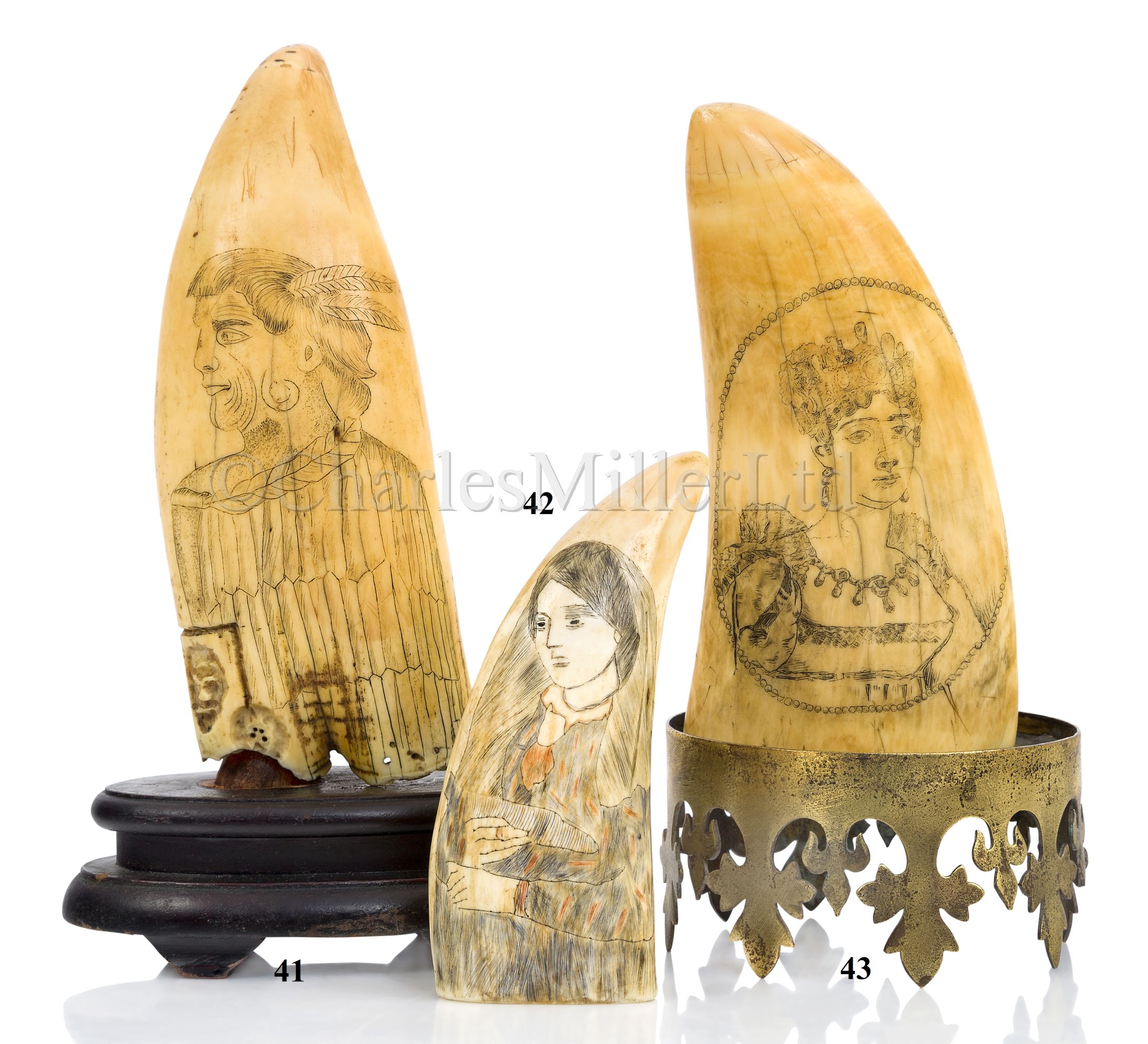 Ø A SCRIMSHAW DECORATED WHALE'S TOOTH