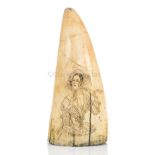 Ø A SAILOR'S SCRIMSHAW DECORATED WHALE'S TOOTH, CIRCA 1840