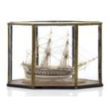 A WELL-PRESENTED EARLY 19TH CENTURY FRENCH NAPOLEONIC PRISONER-OF-WAR BONE SHIP MODEL FOR A