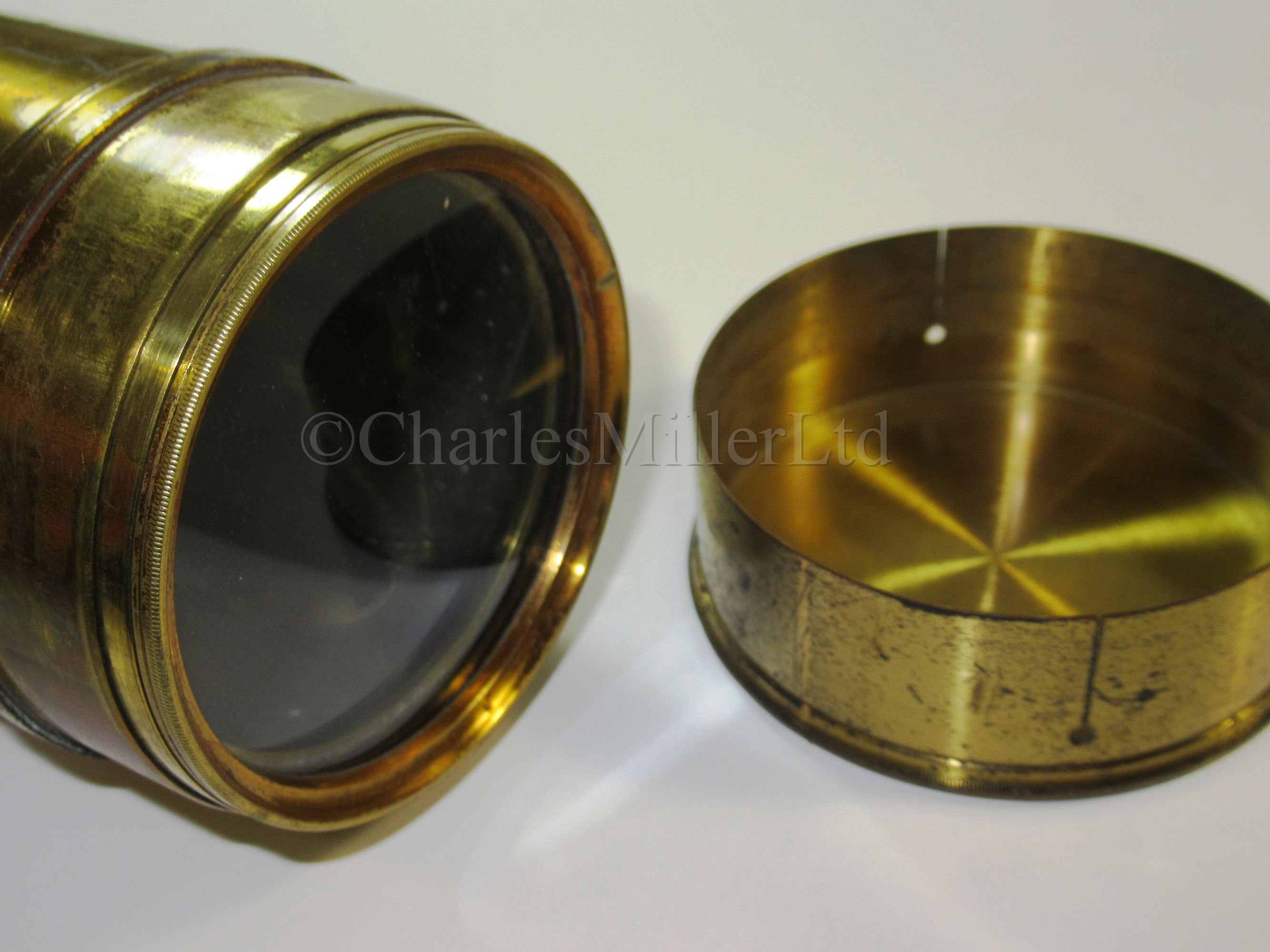 A GOOD 2¼IN. LEATHER AND BRASS MARINE TELESCOPE BY NEGRETTI & ZAMBRA, LONDON, CIRCA 1890